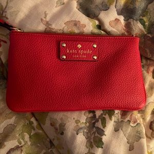 Brand new never used Kate Spade wristlet in pebble leather